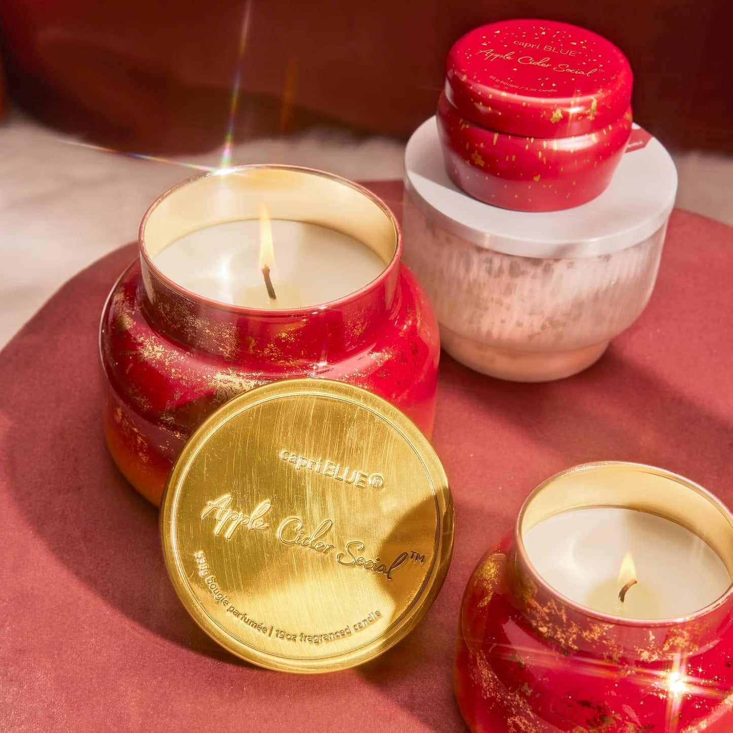 Capri Blue Scented Candles - Glimmer Collection - Ombre Glass Candle Holder - Luxury Apple Candles for Women & Men - Signature Jar in Cranberry Red and Gold (Apple Cider Social, 19 oz)