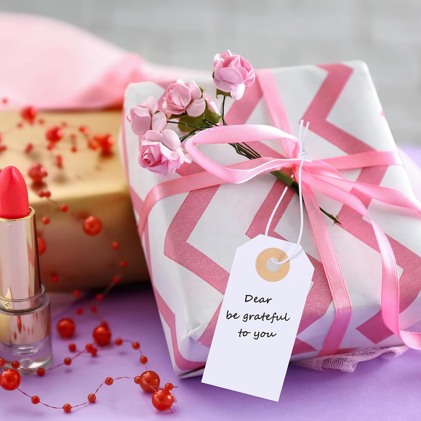 Prudiut 100 Pack Gift Tags with Elastic String White Price Tags Marking Hang Tag Attached Reinforced Hole Writable for Christmas Gifts Inventory Tag Stocking Stuffers 2.75'' x1.37''