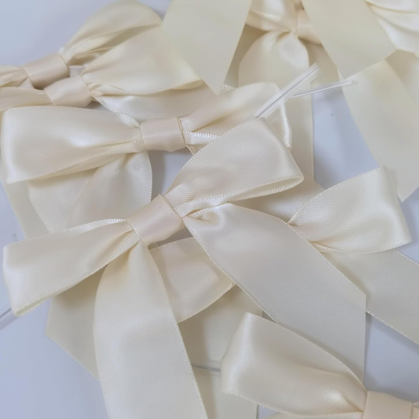 50pcs 3-1/2" Mini Satin Ribbon Bows with Twist Ties for Crafts Cream Color for Gift Wrapping Packing Holiday Candy Decoration (3.5"-Ivory)