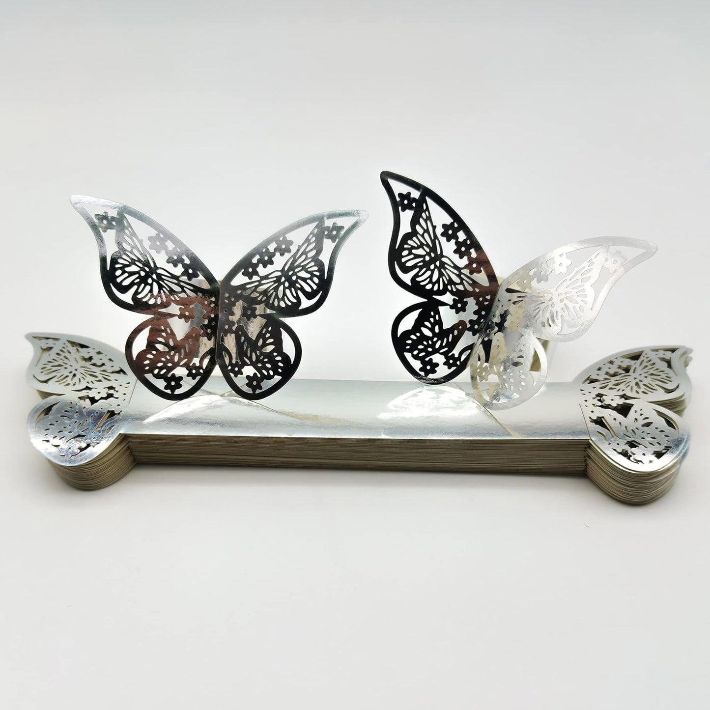 Butterfly Silver Paper Napkin Rings Set of 100 pcs，3D Laser Cut Foil Cutout Paper Napkins Holder,Disposable Serviette Rings for Tables,Decorations,Wedding,Dinner,Party Decor (Silver)